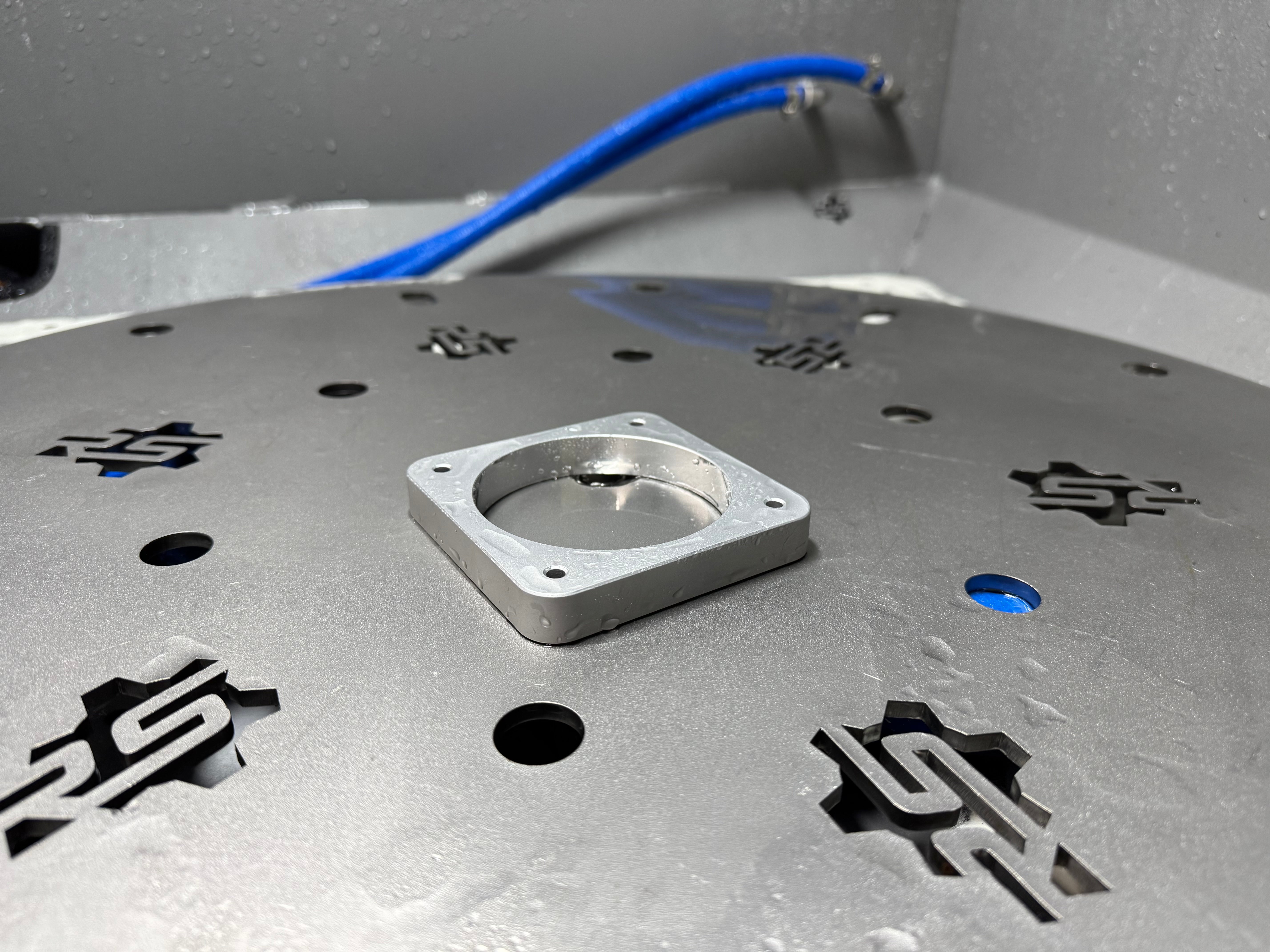 cnc machined automotive part aqua blasted for satin surface finish 